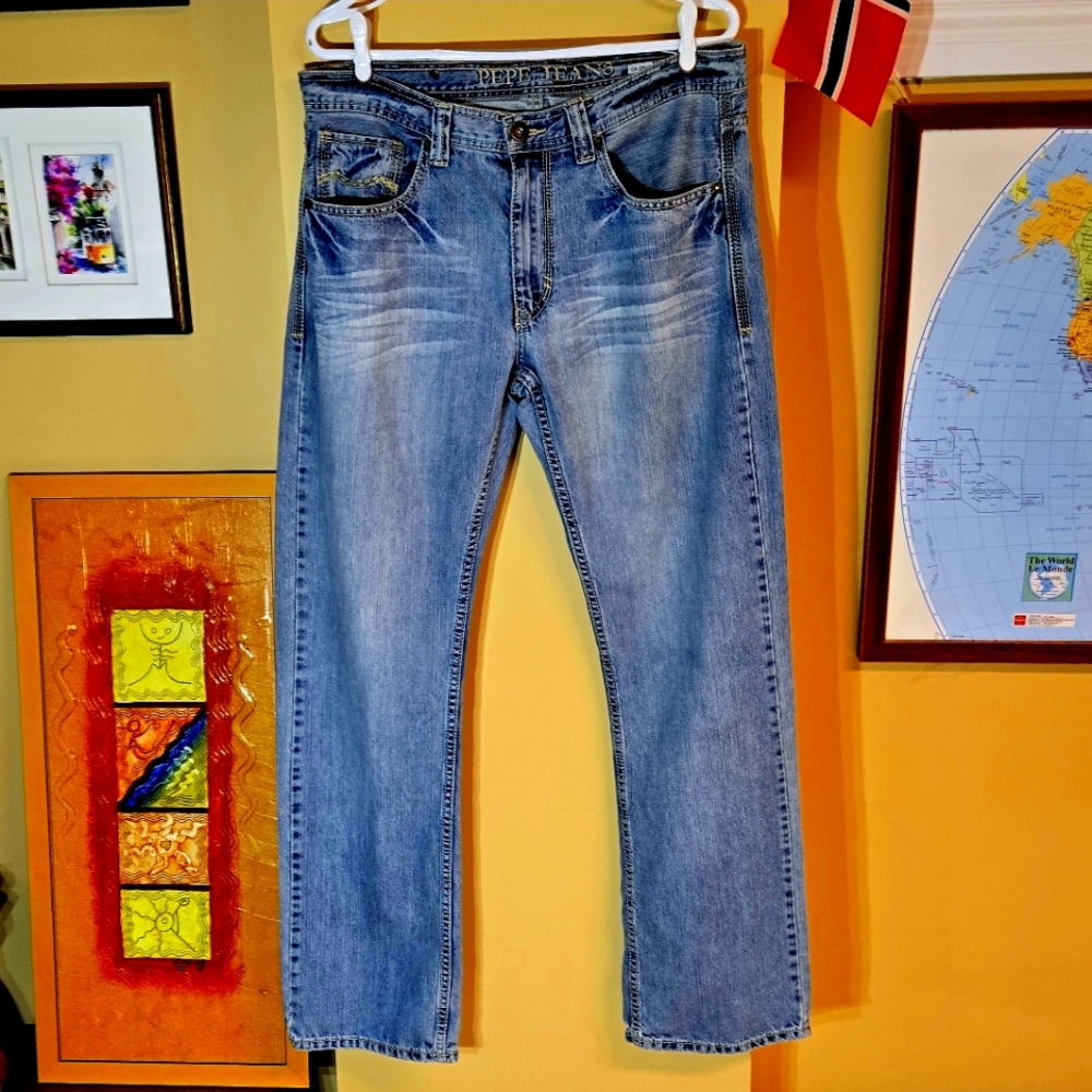 Vintage PEPE Men's blue jeans, embroidered detail, and stud on back pockets